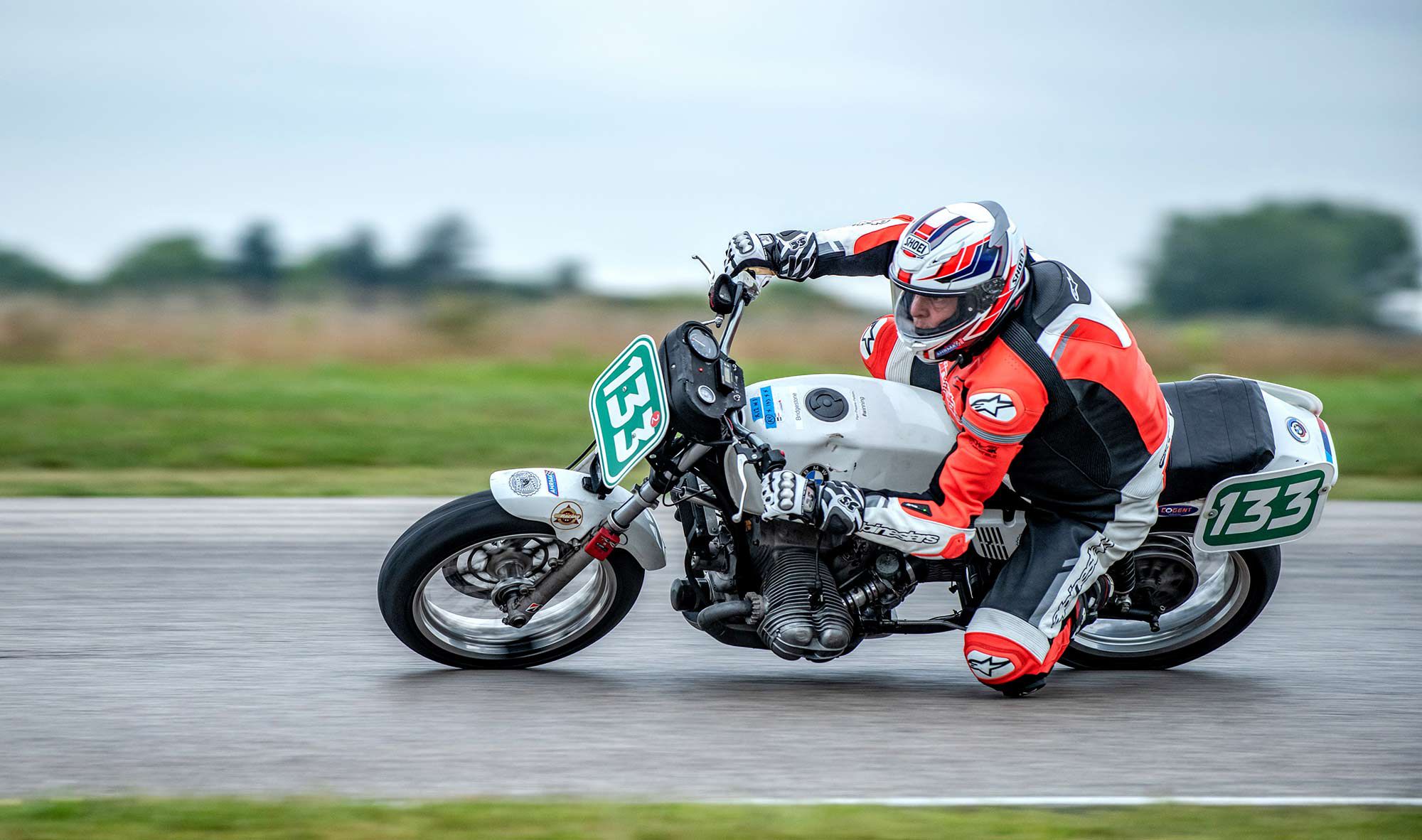 Pro tip: Keep your pucks lower than the cylinders. Veteran racer Paul Elledge hustles his BMW through turn 6 at GingerMan Raceway.