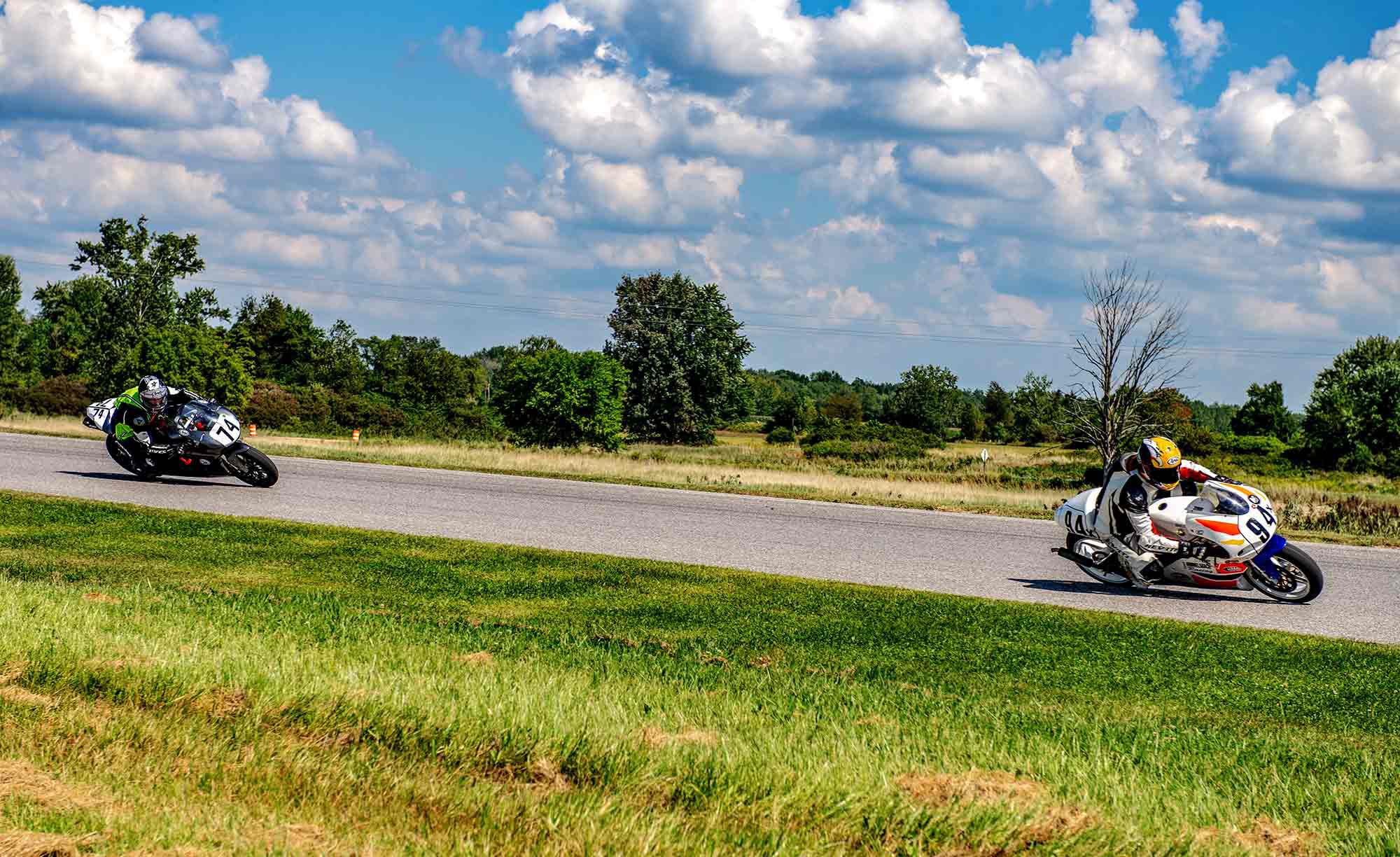 Student Adam Mashike (left) learns the art of carving through turns 10a and 10b at GingerMan Raceway.