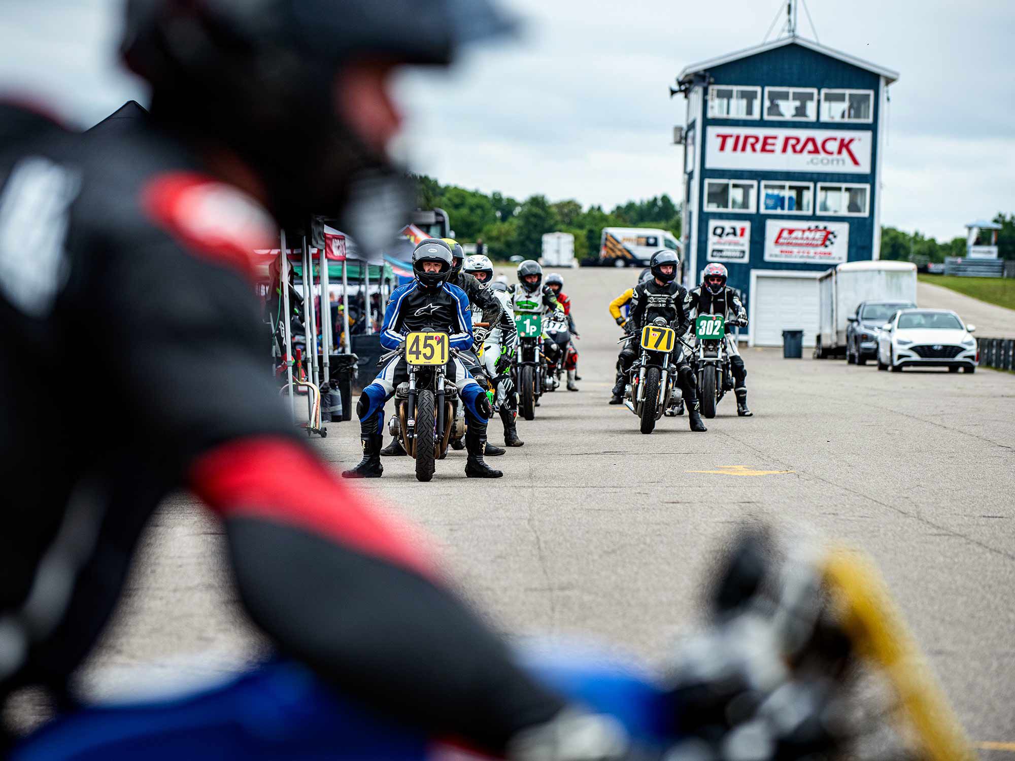 Loud, hot, and extremely close: Racers await the warmup lap.